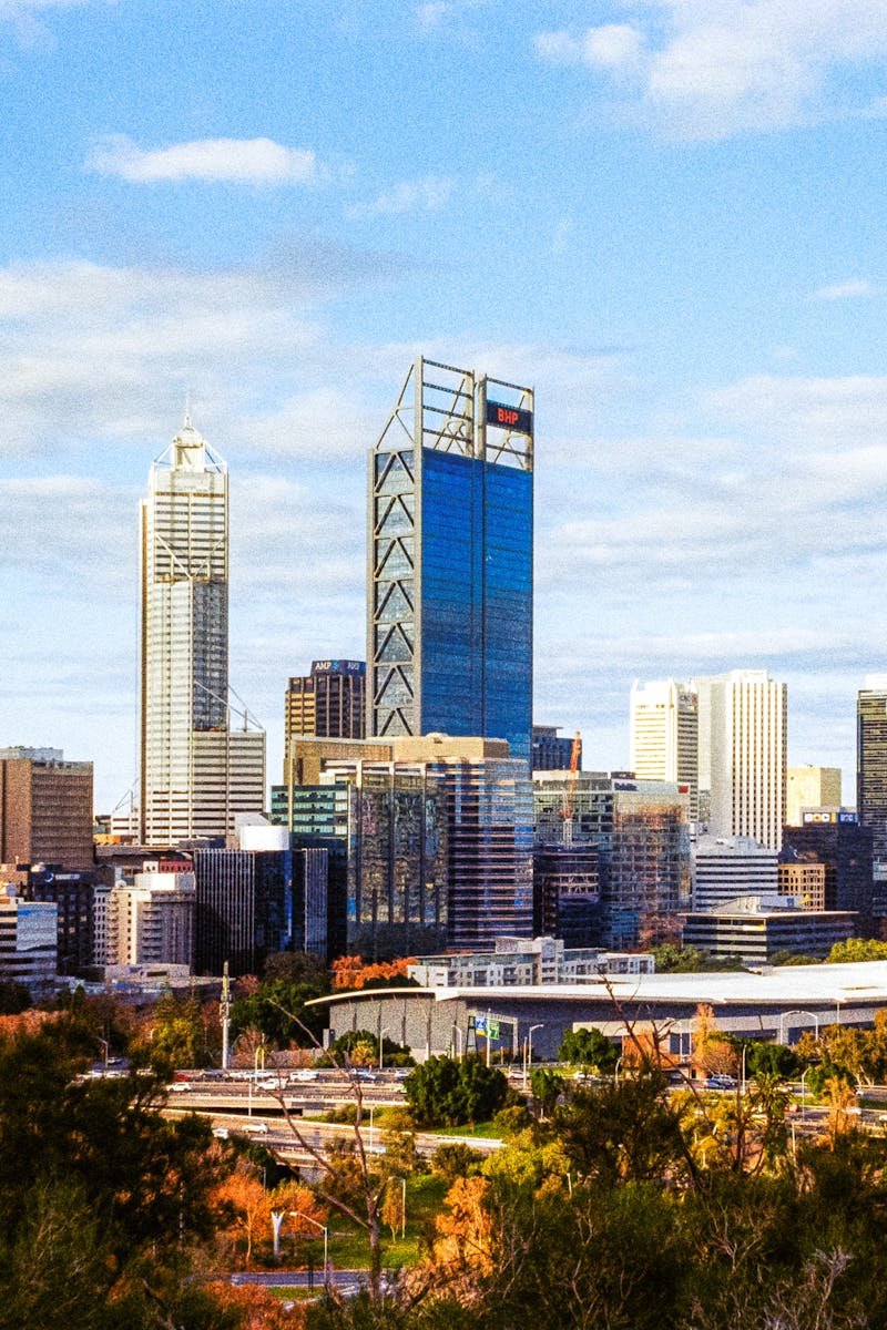 A captivating aerial view of Perth's cityscape featuring modern skyscrapers and urban architecture.